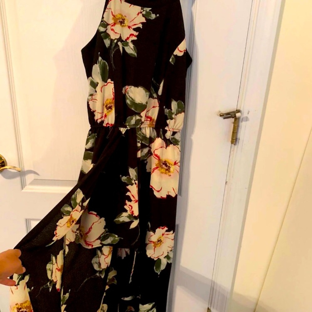 Ladies romper with attached maxi skirt.